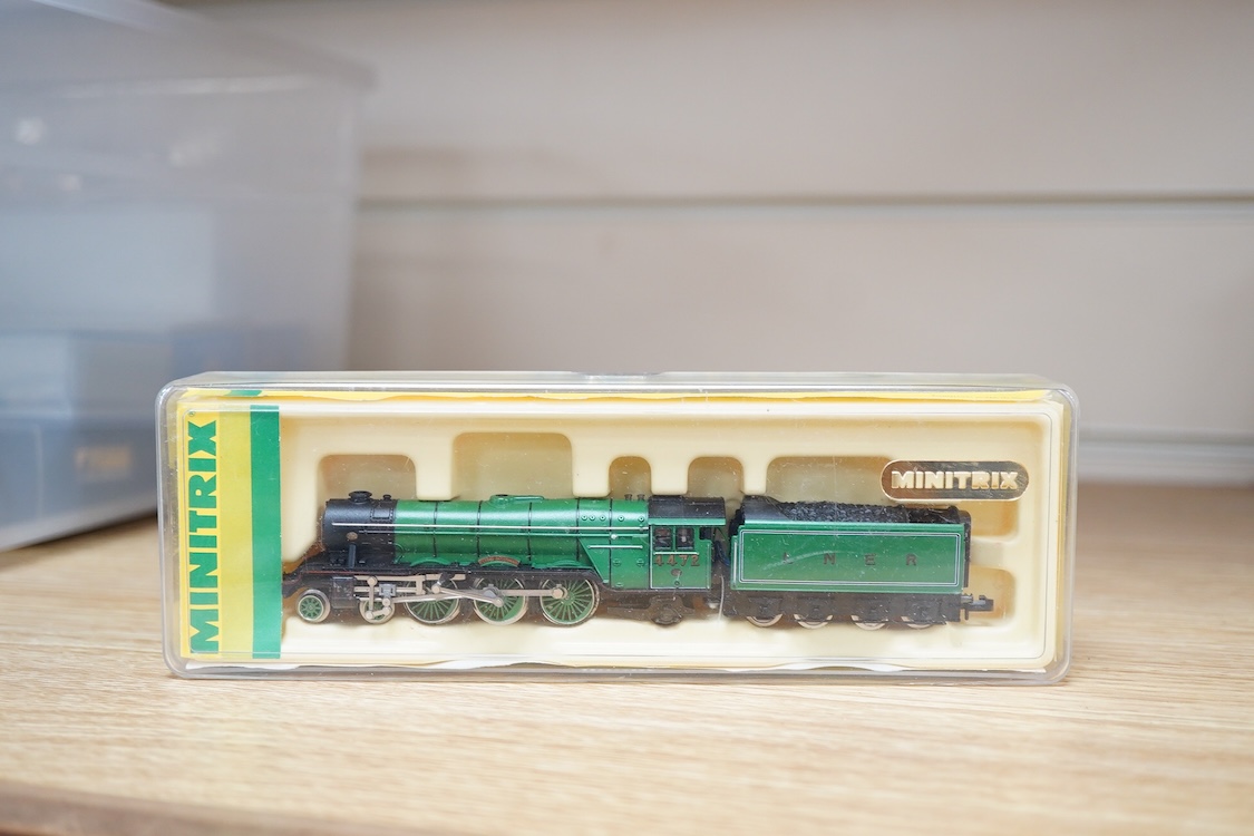 Twenty-eight boxed N gauge railway by Graham Farish, Minitrix, Fleischmann, etc. including four locomotives; an LNER class A3, Flying Scotsman (12950), a BR 0-6-0T, 47160 (N.201), a German DB 0-10-0T, 94 1730, (7094), an